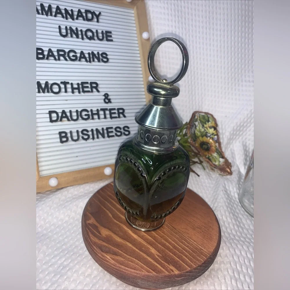 Unique vintage Avon collectible bottle designed in the shape of a lantern.